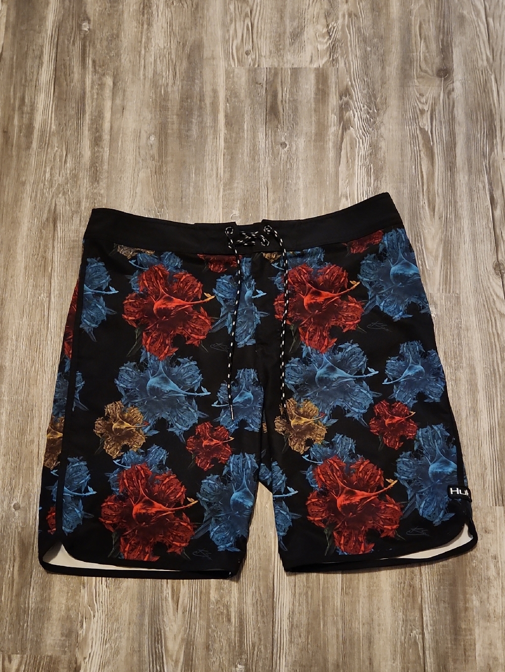 HUK Men’s Black Swim Shorts with Blue, Red & Gold Floral Print